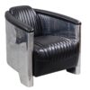 Fauteuil Club DC3 Cuir Noir aviateur impose une présence remarquable. Inspiré de l’univers de l'aviation vintage