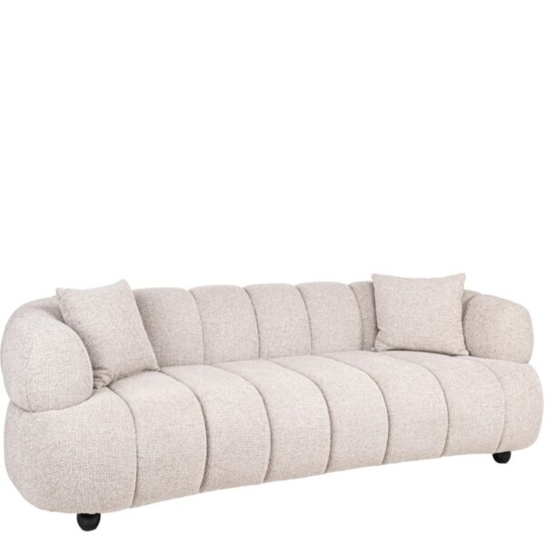 Accueil 4 Canapé Amelia beige capitonné, vue trois quarts, silhouette organique, incurvé, forme arrondie